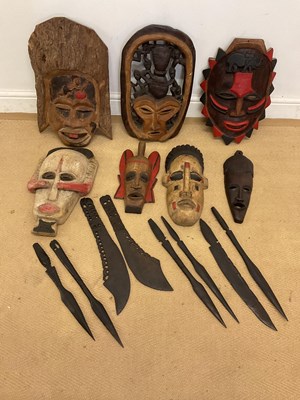 Lot 325 - A group of African tribal carved wooden masks,...