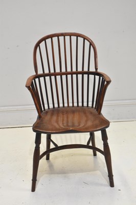 Lot 194 - A 19th century yew wood elm seated Windsor...