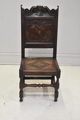 Lot 102 - A 19th century oak Lancashire type hall chair...