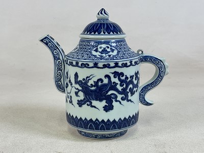 Lot 418 - A Chinese blue and white dragon decorated...