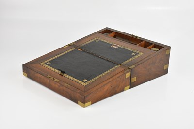 Lot 1082 - A Victorian walnut and brass bound writing...