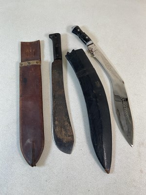 Lot 346 - A large Gurkha's kukri knife, in scabbard, and...