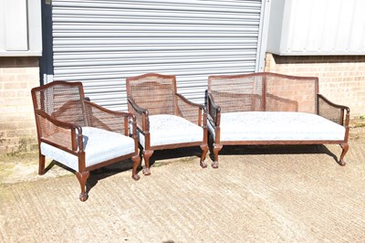 Lot 70 - An early 20th century mahogany bergère suite...