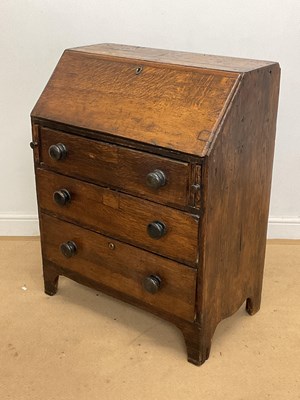 Lot 836 - An oak bureau with three shelves, height 97cm,...