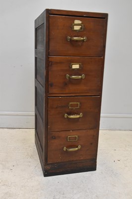 Lot 89 - A vintage stained pine four drawer filing...