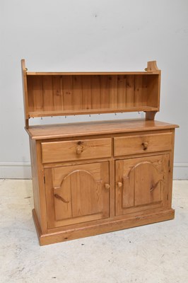 Lot 107 - A modern pine dresser base with two drawers...