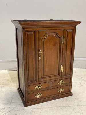 Lot 56 - An 18th century and later oak hanging spice...