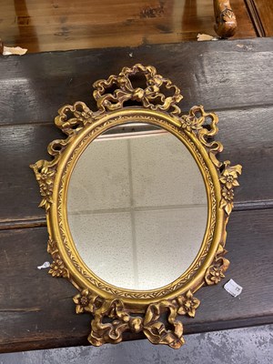 Lot 101 - Two gilt framed wall mirrors, one with shelf,...