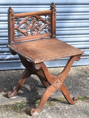 Lot 63 - A small 19th century oak Gothic style side...