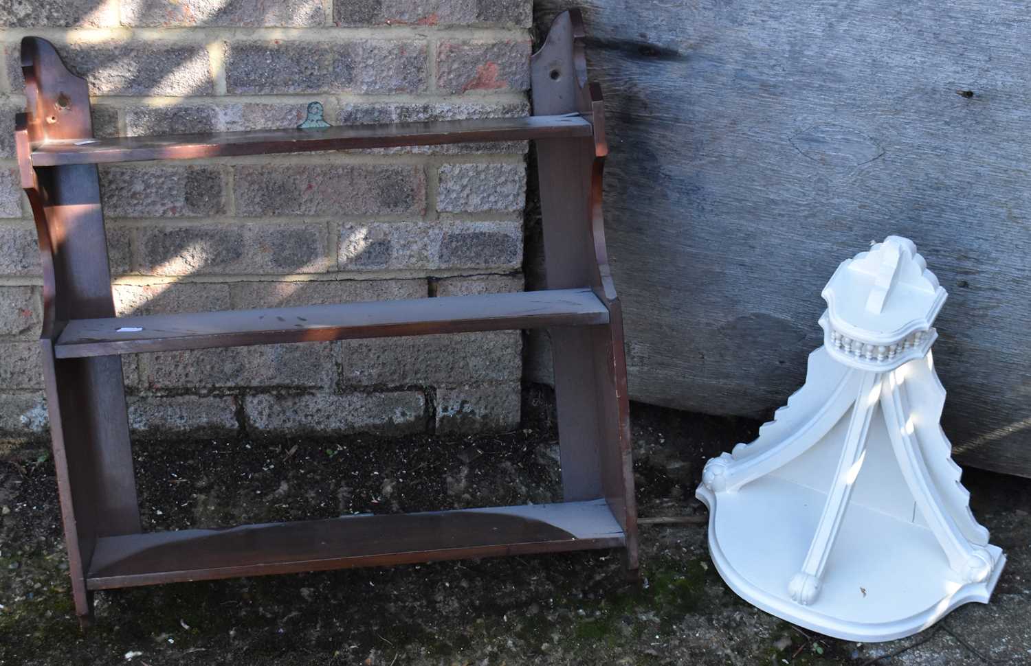 Lot 42 - A white painted Gothic style wall shelf and...