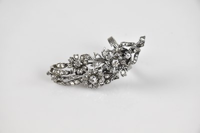 Lot 2306 - A white metal diamond set floral cocktail ring,...
