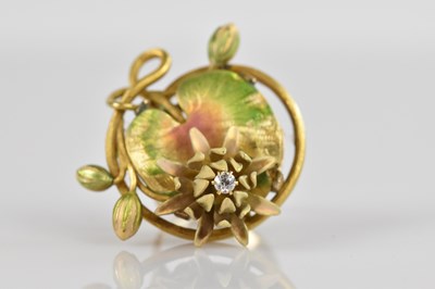Lot 2414 - A 9ct yellow gold and enamel diamond set lily...