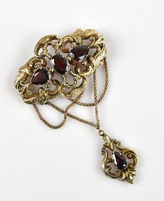 Lot 1282 - A Victorian yellow metal pendant brooch, set...