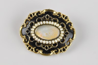 Lot 1298 - A Victorian yellow metal black enamel...