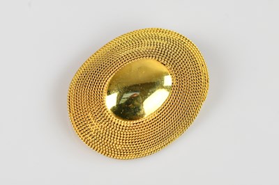 Lot 1350 - An oval yellow metal brooch.