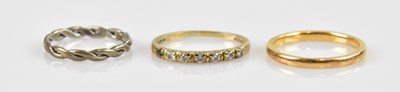 Lot 2480 - A 22ct yellow gold wedding band, size M 1/2,...