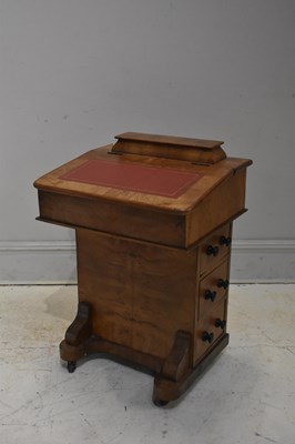 Lot 265 - A Victorian walnut Davenport, with red leather...