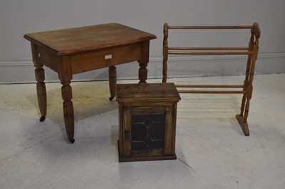 Lot 105 - An old pine side table with single end drawer,...