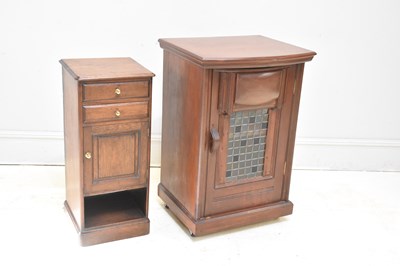 Lot 170 - A hardwood side cabinet with leaded glazed...