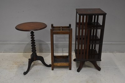 Lot 280 - A mid 20th century revolving bookcase, a 1920s...