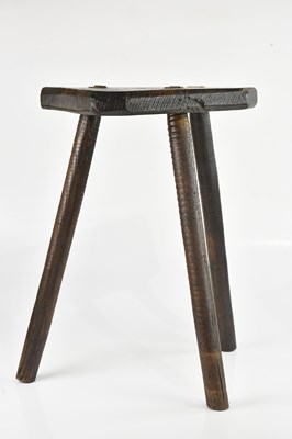 Lot 106 - A country milking stool on turned column legs,...