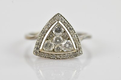Lot 2417 - A 9ct white gold diamond set dress ring, set...