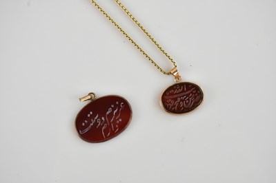 Lot 2100 - An Arabic yellow metal mounted bloodstone seal,...