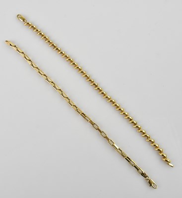 Lot 1225 - A 9ct yellow gold bracelet, length 190mm, and...