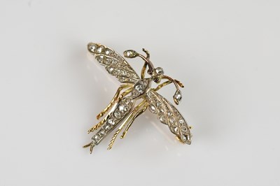 Lot 1283 - A 9ct yellow and white gold dragonfly diamond...