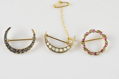 Lot 1291 - Two Victorian yellow metal crescent shaped...