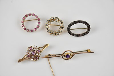 Lot 1301 - A yellow metal diamond and sapphire set...