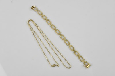Lot 1231 - A 9ct yellow gold openwork bracelet, length...