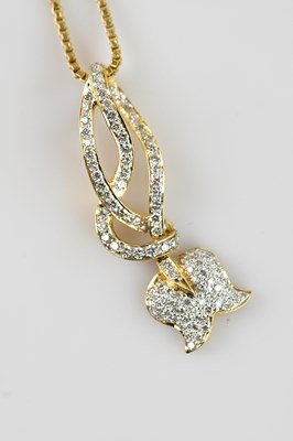 Lot 2130 - A yellow metal diamond set articulated brooch...