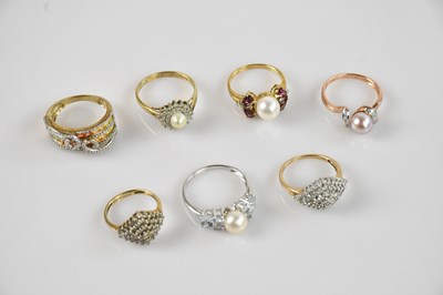 Lot 2327 - A 9ct yellow gold diamond and multigem set...