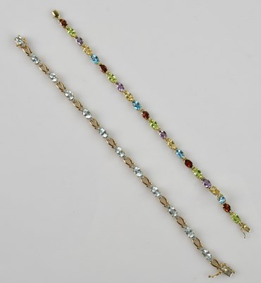 Lot 1196 - A 9ct yellow gold multigem set bracelet,...