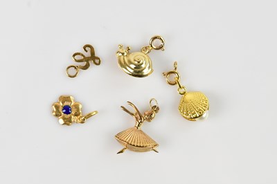Lot 1464 - Five 9ct gold and yellow metal charms...