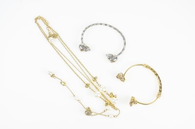 Lot 199 - ALEXANDER MCQUEEN; a gold tone bracelet...