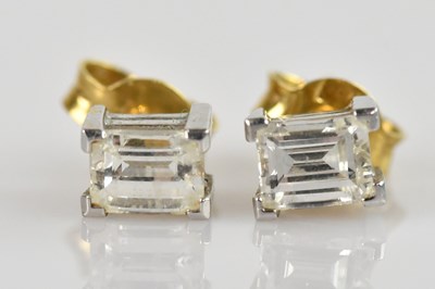 Lot 1372 - A pair of 18ct white and yellow gold diamond...