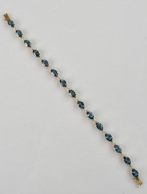 Lot 1194 - A 9ct yellow gold bracelet, set with a mêlée...