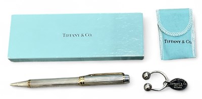 Lot 1472 - TIFFANY & CO; a 925 silver keyring and a...