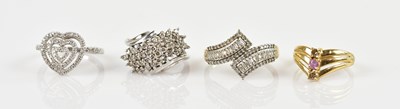 Lot 2410 - A 9ct white gold diamond set dress ring, with...