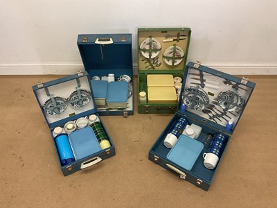 Lot 45 - Four Brexton 1960s picnic sets with contents.