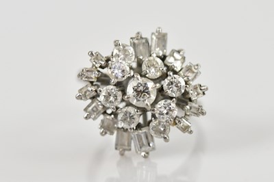 Lot 2326 - An 18ct white gold diamond set cocktail ring,...