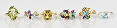 Lot 2407 - Six 9ct yellow gold gem set dress rings,...