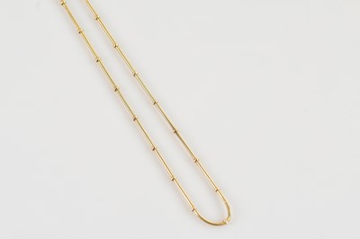 Lot 1241 - A yellow metal fine fancy link chain, stamped '...
