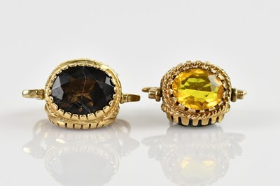 Lot 1453 - Two 9ct yellow gold swivel fobs, the larger...