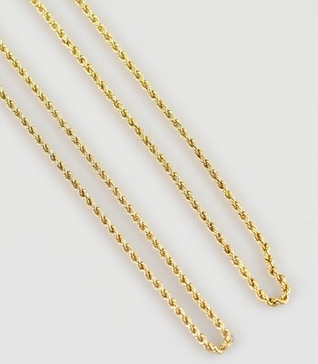 Lot 2197 - Two yellow metal rope twist necklaces, lengths...