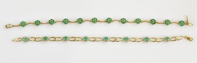Lot 1189 - A 9ct yellow gold openwork bracelet, set with...