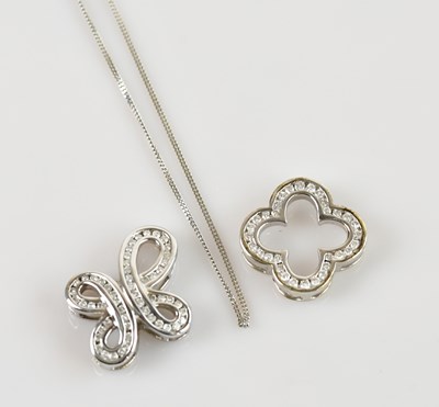 Lot 2175 - A 9ct yellow gold diamond set pendant, set...