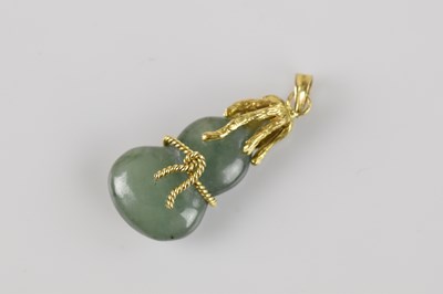 Lot 2178 - A Chinese yellow metal mounted hardstone...